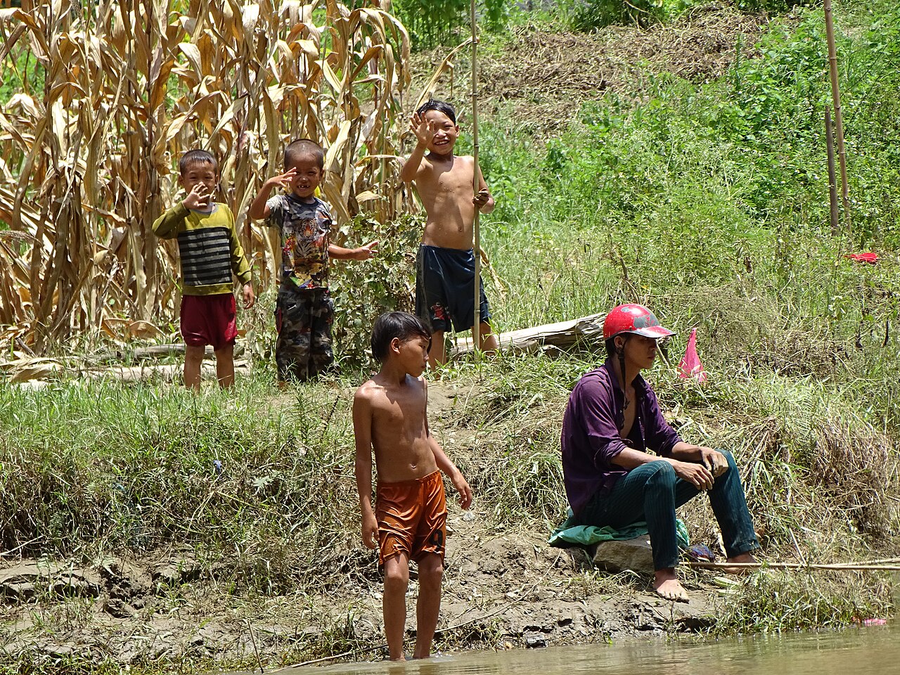 Group of Boys and Man - Shore of Ba Be Lake - Ba Be National Park - Vietnam (48102345273)