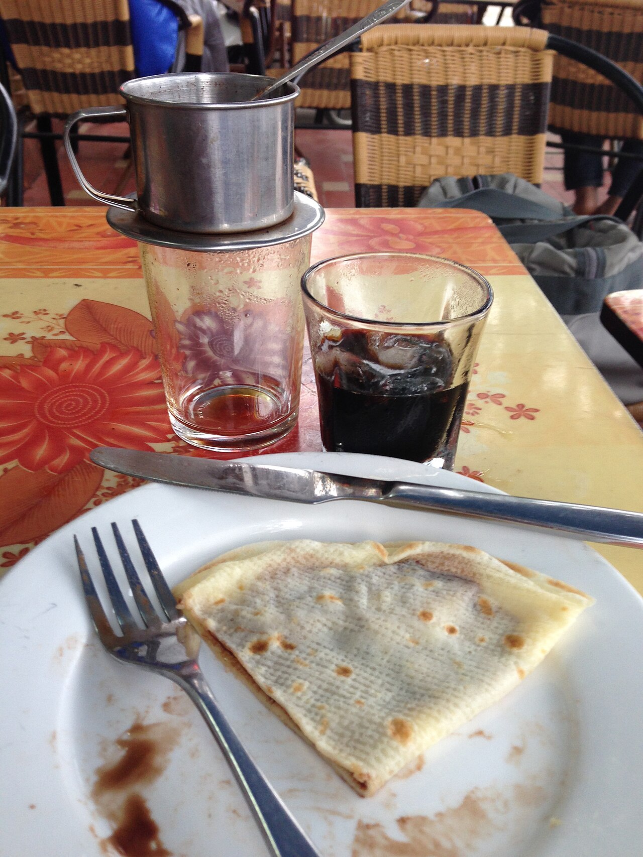 Vietnamese iced coffee and a crepe, Lào Cai, Vietnam - 20131027