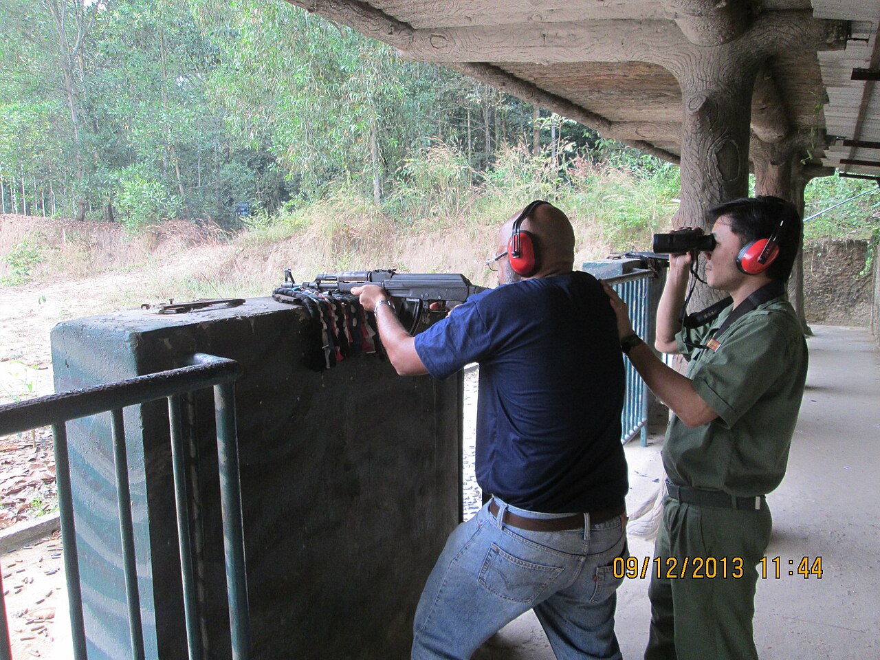 Tourist Rudolph.A.Furtado at the 'Cu Chi Tunnels' firing range in Vietnam.
