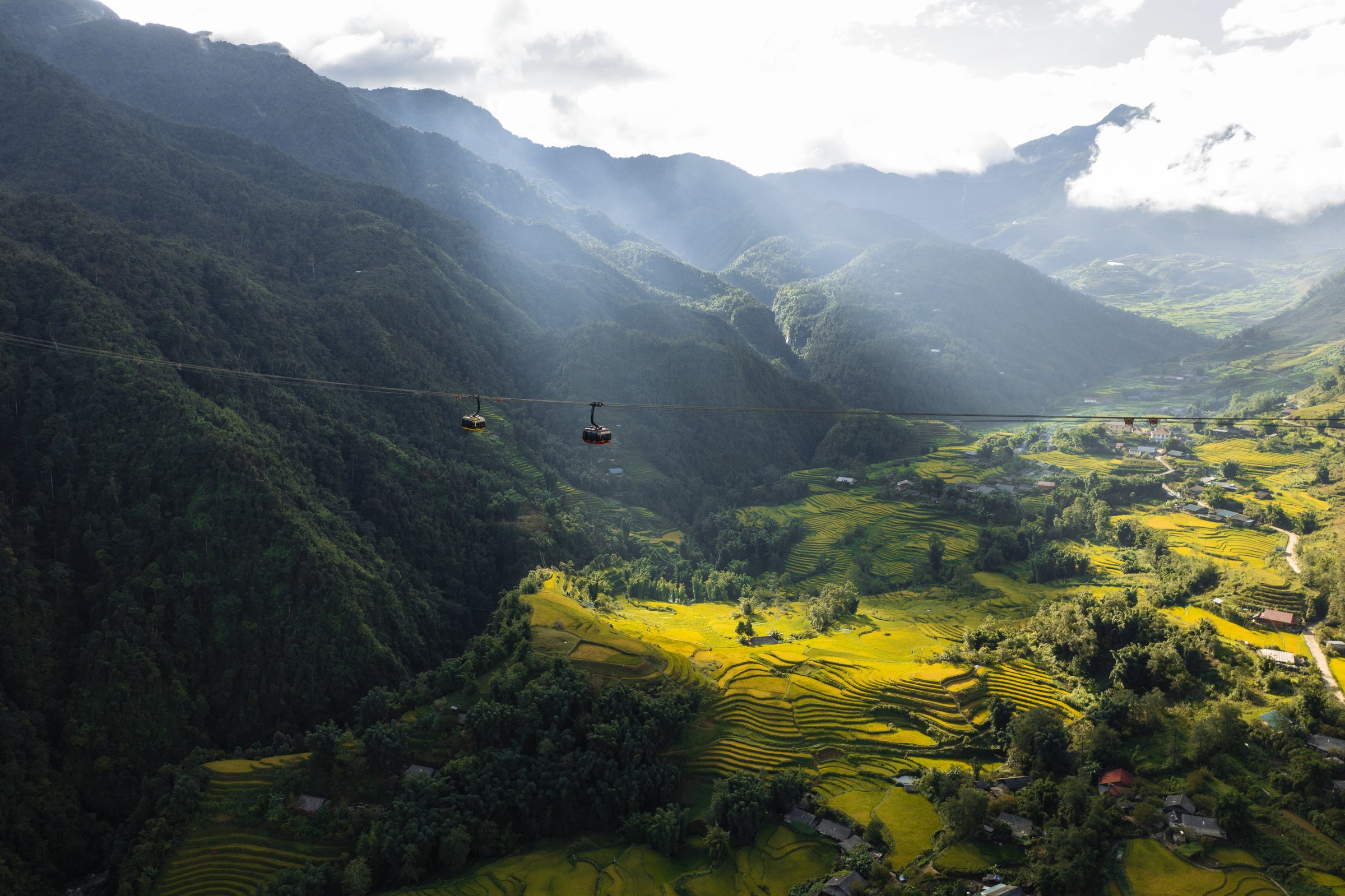 Fansipan cable car misty mountain valley Sa Pa Vietnam