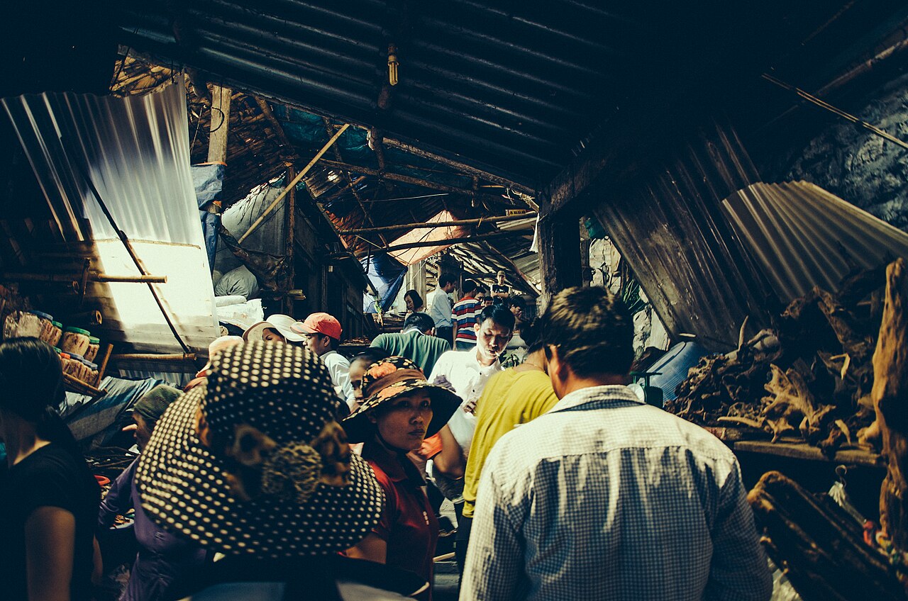 Busy street market (Unsplash)