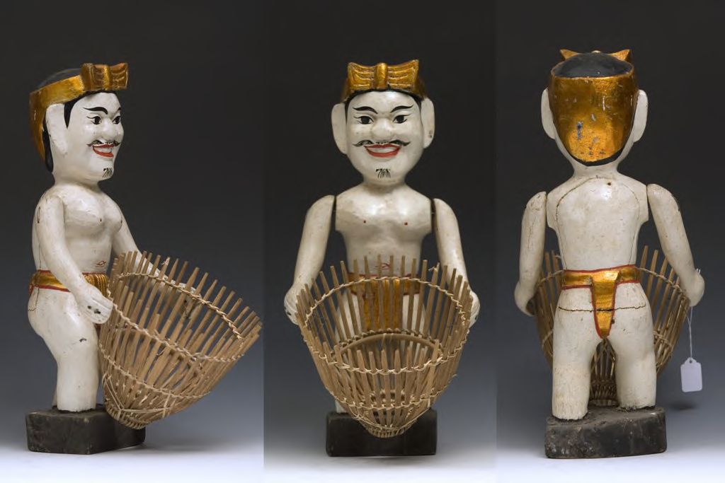 Water puppet holding Basket 0237 - DPLA - c525915740a1149a820fdb45af32b84c