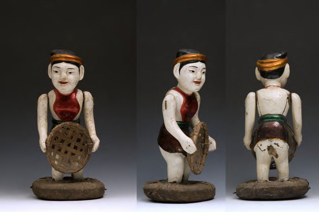 Water puppet holding basket 0238 - DPLA - 00cfc011af47cb2d721f832ba3b4b193
